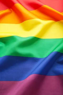 A rainbow flag background with copy space. Vertical foto Stock Photos