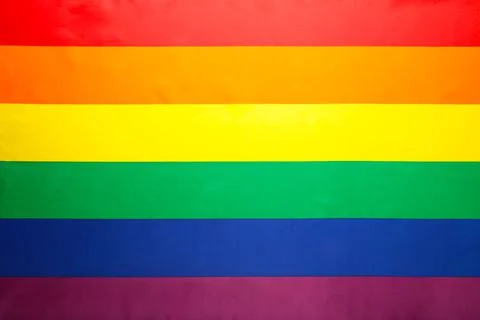 A rainbow flag background with copy space. Foto stock