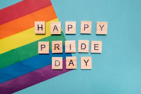 Rainbow flag is on a blue background Foto stock