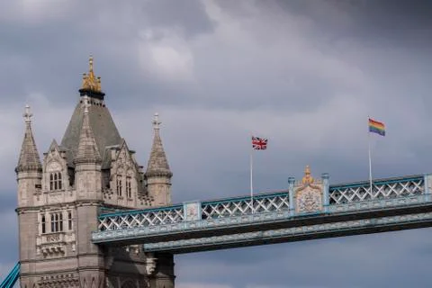 The Rainbow Flag flies alongside the Union Flag on Tower Bridge in support of Stock Photos