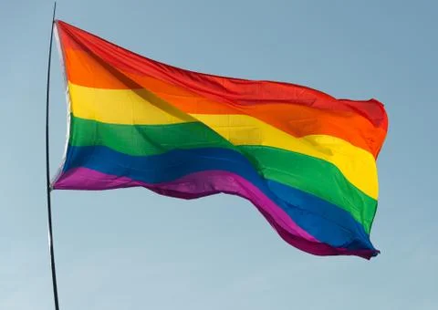 Rainbow Flag flying Stock Photos