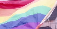 Rainbow Flag - Gay Pride Flying Briskly In Wind Stock Footage