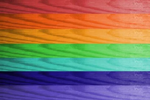 Rainbow Flag Pattern On Wooden Surface. Rainbow From Multi-Coloured Wood Back Stock Photos
