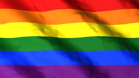 Rainbow flag waving in the wind. LGBT symbol. Pride flag Stock Footage 168468886