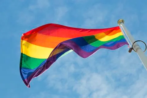 Rainbow Flag waving in the wind Stock Photos
