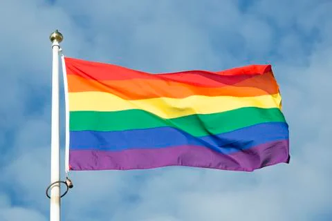 Rainbow Flag waving in the wind Stock-Fotos