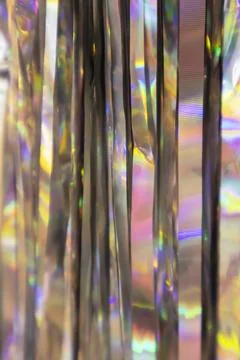 Rainbow foil strips, consisting of many thin lines that reflect light and s.. Stock Photos