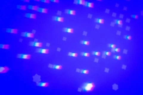 Rainbow gobo light pattern with colorful streaks and stars Foto stock