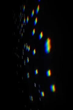 Rainbow gobo light pattern with colorful streaks and stars Foto stock