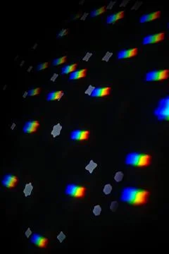 Rainbow gobo light pattern with colorful streaks and stars 스톡 사진