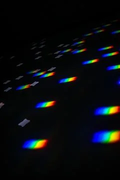 Rainbow gobo light pattern with colorful streaks and stars Stock Photos