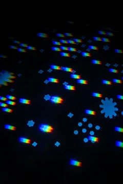 Rainbow gobo light pattern with colorful streaks and stars 스톡 사진