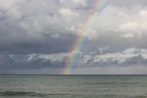 A rainbow going down on the Black Sea. Stock Photos