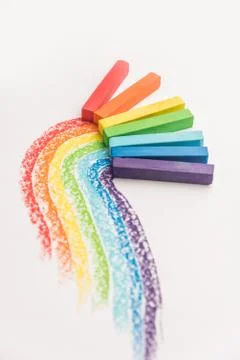 Rainbow gradient made of pastel crayon chalks over the colorful traces Fotos Stock