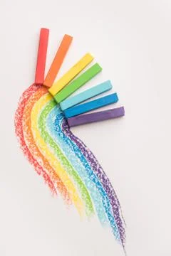 Rainbow gradient made of pastel crayon chalks over the colorful traces Fotos Stock