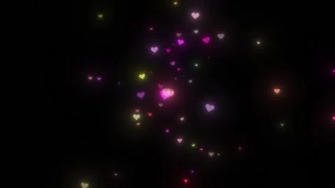 Rainbow hearts flutter in front of the camera. Feast of loving hearts. Stock Footage 151104621