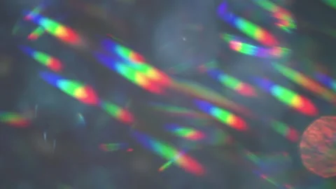 Rainbow highlights reflection. Blur sparks background. Vidéo 216781738