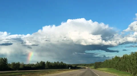 Rainbow from highway, Alberta Canada Vídeo Stock 65500282