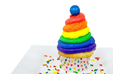 Rainbow icing on cupcake Stock Photos