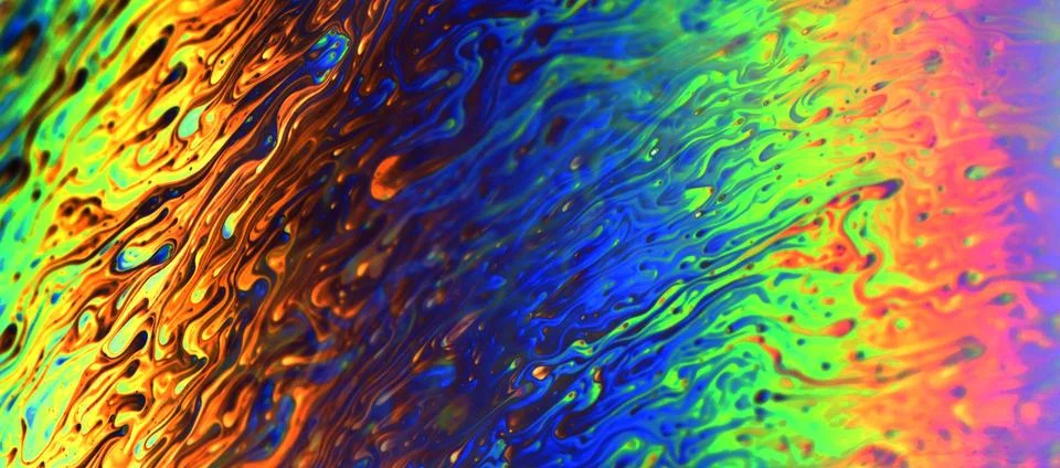Rainbow iridescent fluid texture, macro abstract background Illustrazione stock