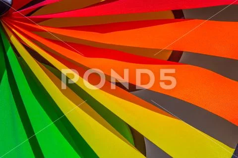 Rainbow lgbt pride spinning pinwheel. Symbol of sexual minorities, gays and l Stock Photos