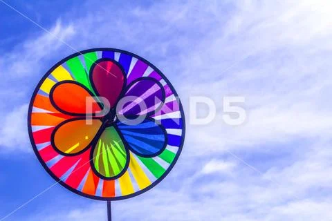 Rainbow lgbt pride spinning pinwheel. Symbol of sexual minorities, gays and l Stock Photos