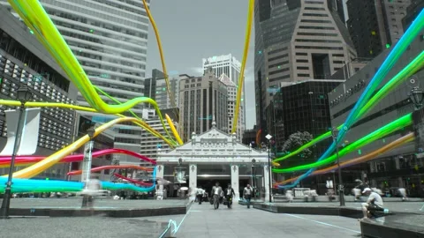 Rainbow licorice candy laces flying through cityscape Stock Footage 150787476