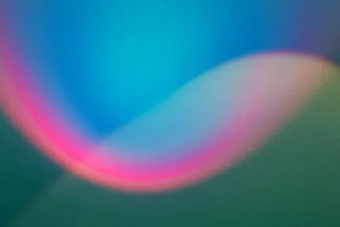 Rainbow light beam on plaster wall. multicolored abstract design background Foto stock