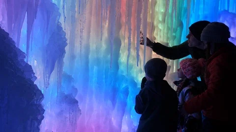 Rainbow light beautiful icicles and happy family Stock-Footage 124388120