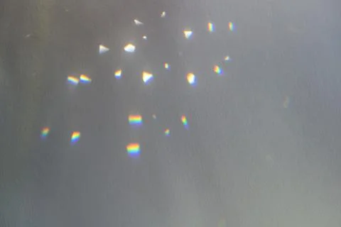 Rainbow light crystal leak overlay background. Prism glass flare effect texture Stock Photos