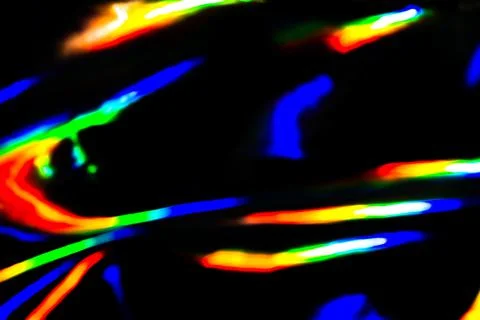 Rainbow light crystal leak selective focus overlay black background. Prism glass Illustrazione stock