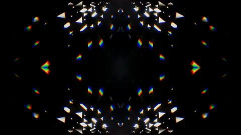 Rainbow light crystal leak selective focus overlay black background. Prism glass Stock Photos