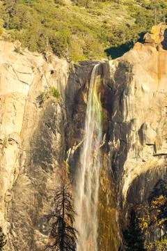 Rainbow light diffraction at the top of the Bridalveil Fall in Yosemite National Stock Photos