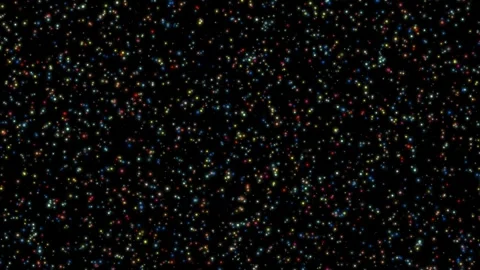 Rainbow microparticles. Multi-colored dots drifting in a dark space. Stock Footage 320934335