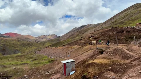 Rainbow Mountain trailhead pano view llamas Vinicunca Peru Perú morning blue Stock Footage 328591658