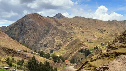 Rainbow Mountain trailhead road to Cusipata Vinicunca Peru Perú morning blue Stock Footage 328591433
