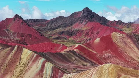 Rainbow Mountain Vinicunca Peru Perú aerial drone morning blue sky Montaña de Stock Footage 323051959