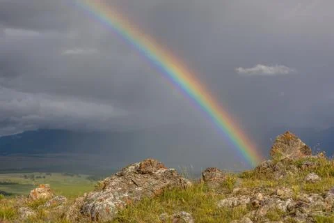 Rainbow mountains cloud sky rain Stock Photos