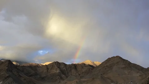 Rainbow in the mountains in the evening sky Stock Footage 96027858