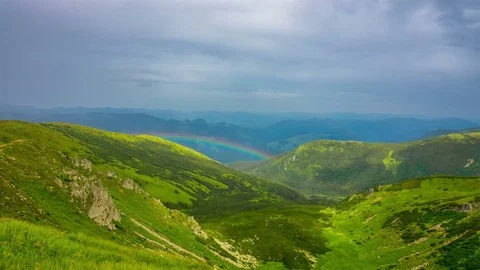 Rainbow in the Mountains Stock Footage 78418917