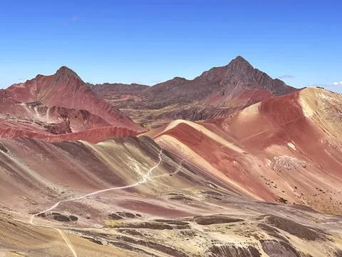 Rainbow mountains in Peru, view from Vinicunca peak Stock Photos