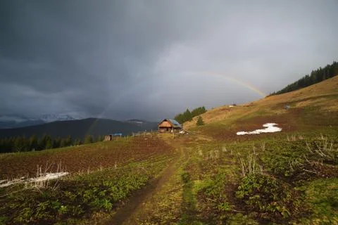 Rainbow in the mountains Stock Photos