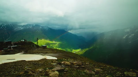 Rainbow in mountain's valley. Timelaps Stock Footage 44181342