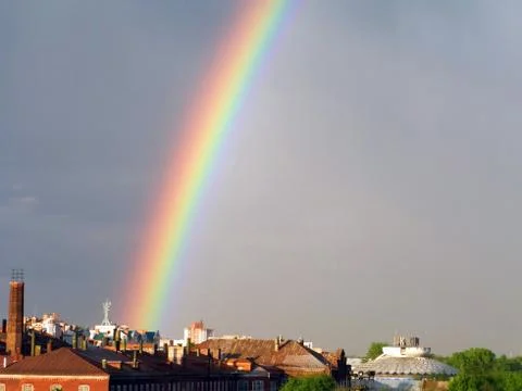 Rainbow multi color image in blue sky rain nature Stock Photos