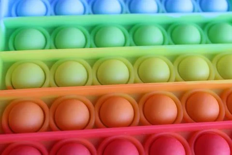 Rainbow multicolor toy popit simple dimple for children anti-stress for relax Stock Photos