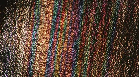 Rainbow Oil Reflections on Pitted Hull 1 Stock Footage 10974365