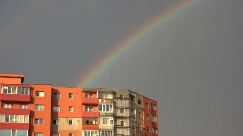 Rainbow over block of flats in a poor town, hope arise 4k Video stock 46213087
