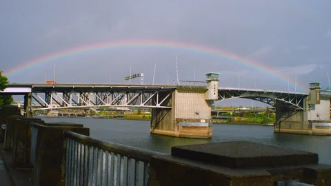 Rainbow Over Bridge with Camera Pan Vídeo Stock 127738193