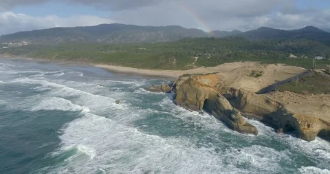 Rainbow Over Cape Kiwanda On the Oregon Coast at Tierra DEl Mar Pacific City Stock Footage 129226674
