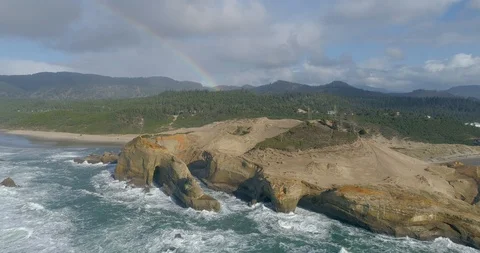 Rainbow Over Cape Kiwanda On the Oregon Coast at Tierra DEl Mar Pacific City Stock Footage 129227164
